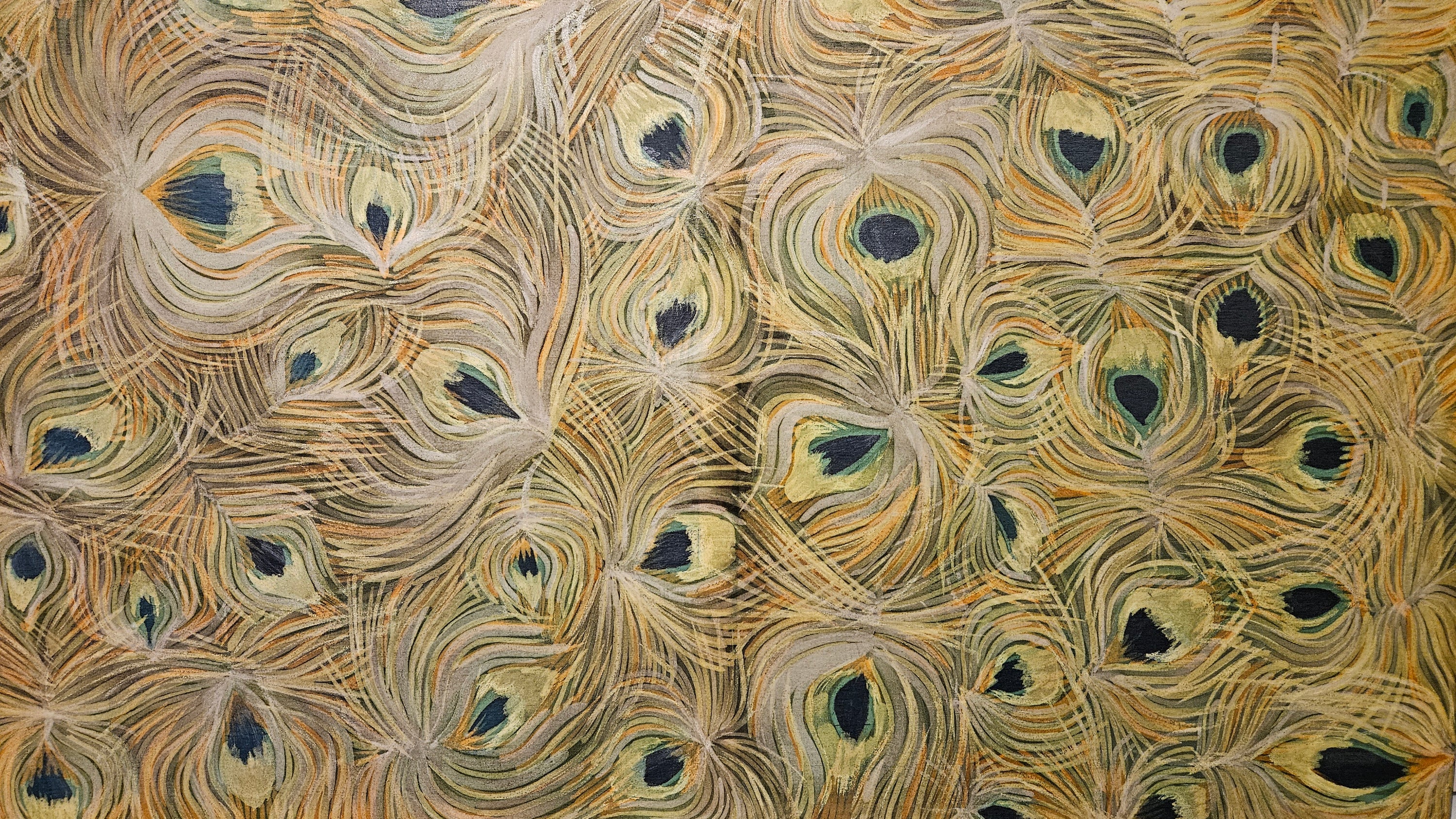 Close-up of a peacock feather pattern with intricate details.